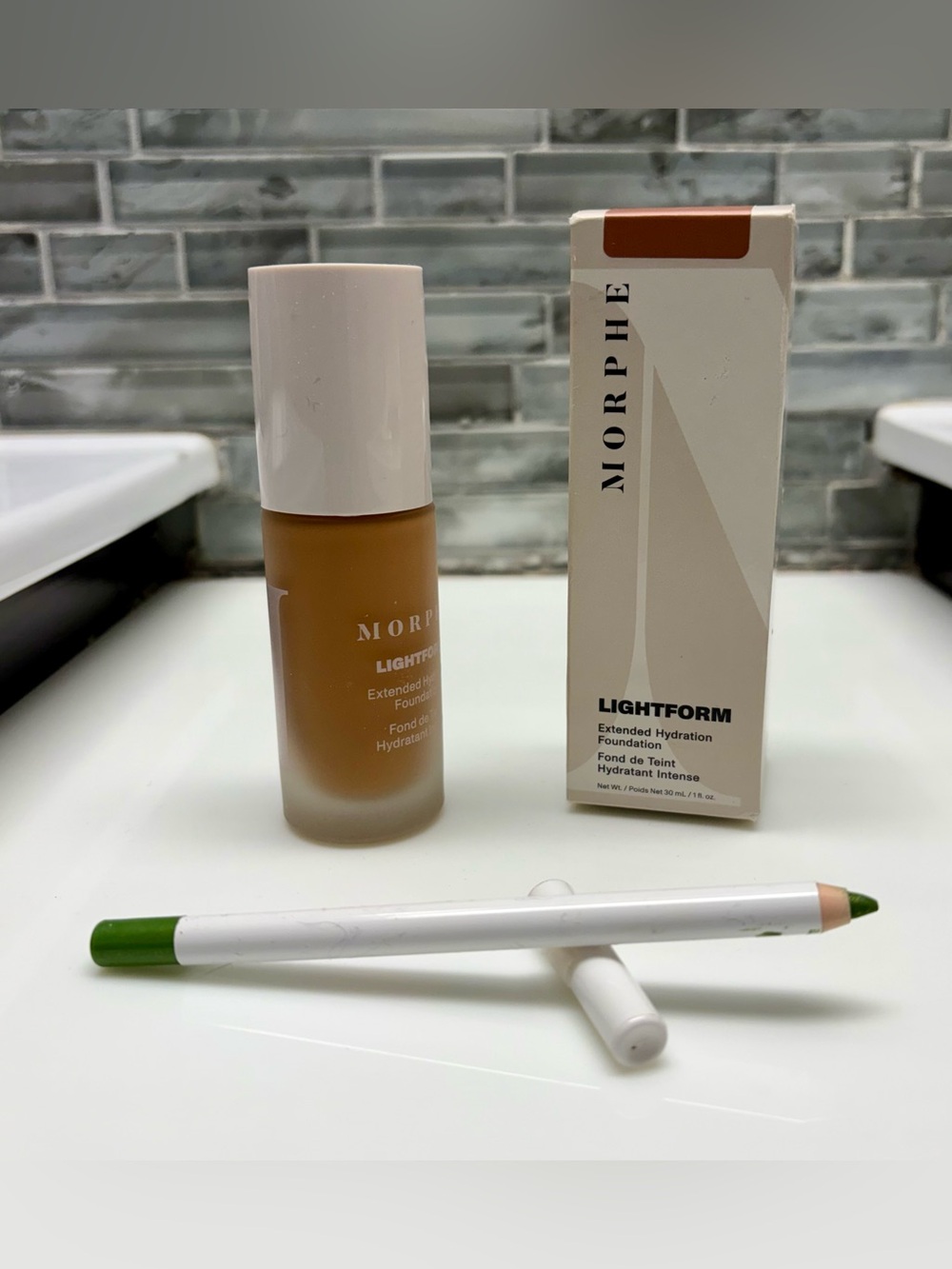 Morphe Lightform Extended Hydration Foundation 20W, 1 fl oz. + Green eye pencil.